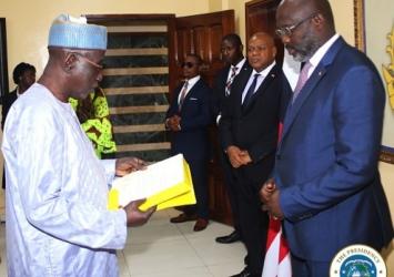 Gambia's Ambassador reads and presents his letter of credence to Dr. George Manneh Weah
Executive Mansion