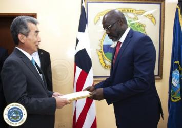 Gen. Lee In-Tae, Ambassador of Korea presents his letter of Credence to the  President of Liberia, Dr. George Manneh WeahExecutive Mansion