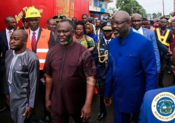 President Weah inspecting the ongoing road construction in Old Road communityExecutive Mansion Photo