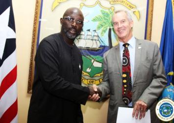 President Weah pose with the Ambassador of Australia, H E Andrew Barnes.jpgEXECUTIVE MANSION