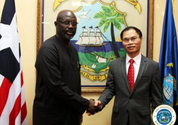 President Weah pose with the Ambassador of Vietnam, H E Pham Anh Tuan .jpgEXECUTIVE MANSION