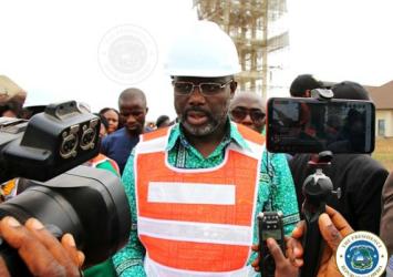 President Weah speaking to the media following the tour of the 14th Military Hospital facilityExecutive Mansion Photo