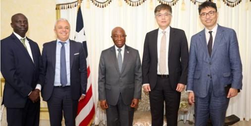IMF Delegation posed in a photograph with President Boakai